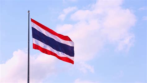 Thai national flag on pole waving in the wind sky background. 3600746 Stock Video at Vecteezy