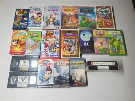 LOT OF 21 Mixed Kids Cartoons/ Disney VHS Tapes free shipping EUR 33,29 ...