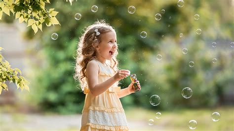 Smiling Little Girl Child Is Playing With Bubbles HD Cute Wallpapers | HD Wallpapers | ID #54738