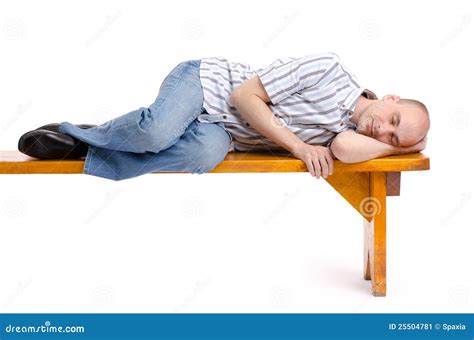 Man Sleeping On A Bench Stock Image - Image: 25504781