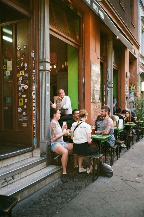 People Eating Outside the Building · Free Stock Photo