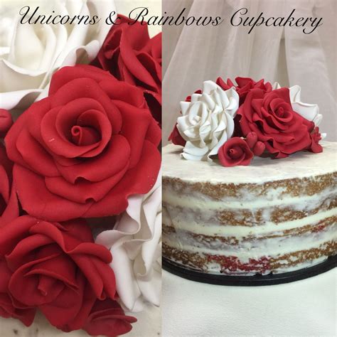 Vanilla mud cake with raspberry filling. Beautiful handmade gum paste flowers in red and white ...