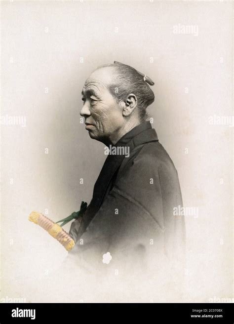 [ 1890s Japan - Samurai with Chonmage ] — Profile view of a samurai official with a sword and ...