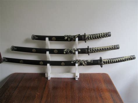 Three samurai sword on stand - Katana set - Catawiki