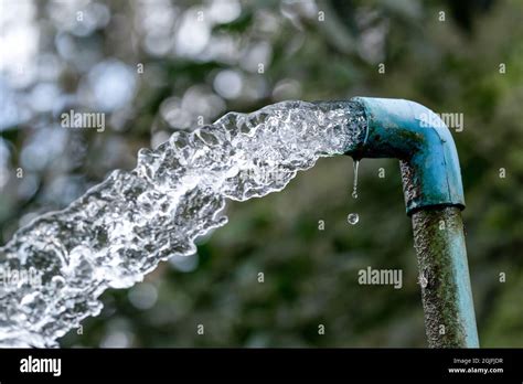 Blue pipe water flow equipment agriculture Stock Photo - Alamy