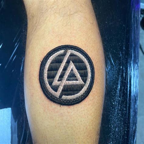 Linkin park patch tattoo done on the calf, embroidery