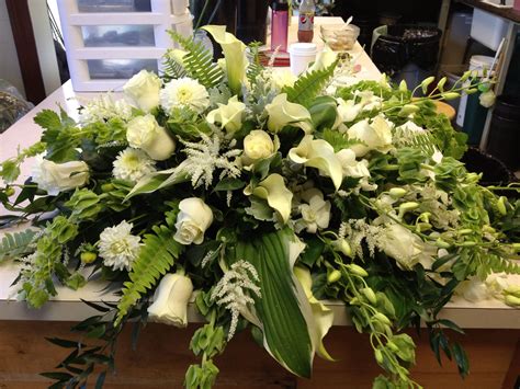 Pin by Concord Flower Shop on Funerals / Sympathy | Casket flowers, Funeral floral arrangements ...