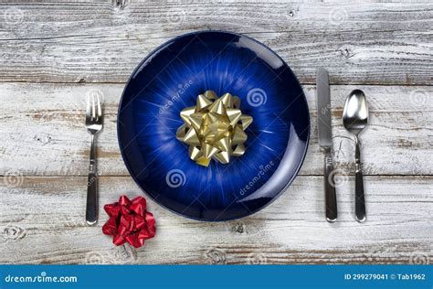 Winter Holiday Table Setting with Vintage Cutlery, Empty Blue Plate ...
