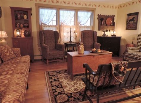 I think of this as an old-fashioned country living room style. Comfortable, pretty in a busy ...