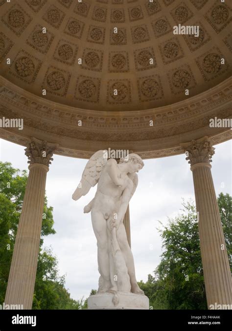 The Petit Trianon Temple of Love Cupid statue and dome Stock Photo - Alamy