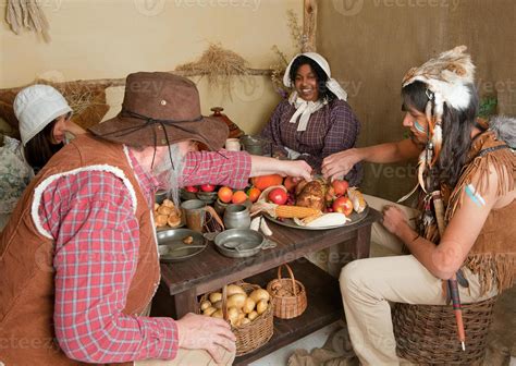 Thanksgiving pilgrims eating 1186282 Stock Photo at Vecteezy