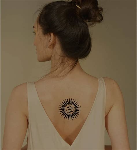 Details 146+ spiral sun tattoo designs latest - vova.edu.vn