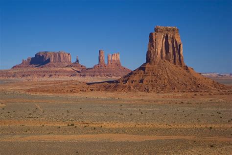 Desert Landscape With Rock Formations Photograph by Mike Theiss