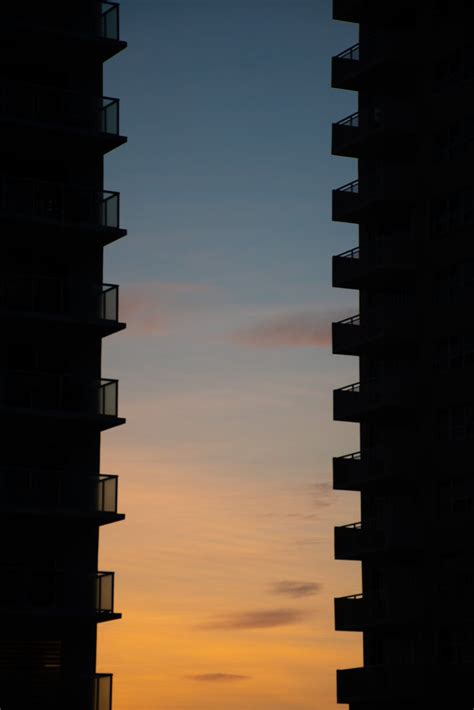 Silhouette of Building during Sunset · Free Stock Photo