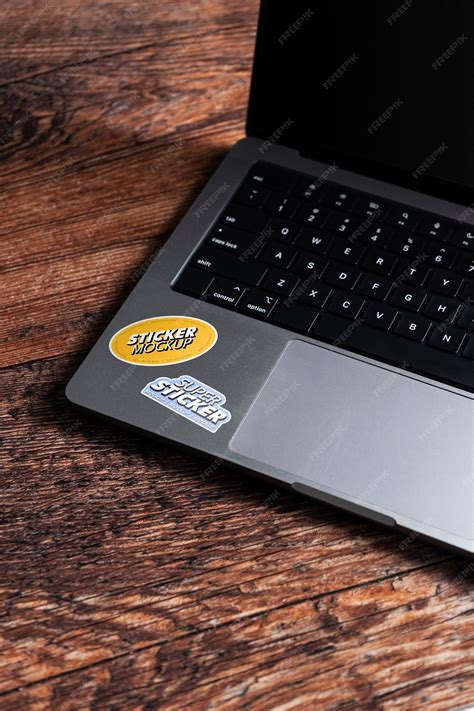 Premium PSD | Adhesive sticker on laptop device