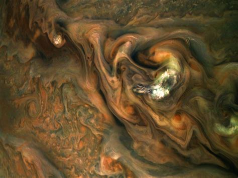 Breathtaking Image Shows Clouds on Jupiter Soaring Above Its Swirling Atmosphere : ScienceAlert