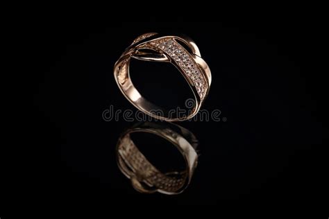 Wedding Gold Ring with a Stone on a Black Background Stock Image ...