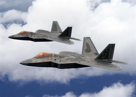 Two F-22 Raptors fly over Joint Base Pearl Harbor-Hickam, Hawaii, Dec. 5, 2019. [4557x3255] : r ...