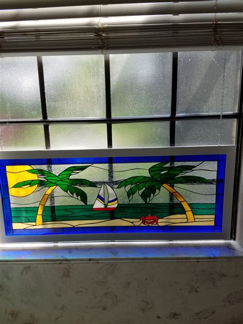 Multiple Ocean Themed Stained Glass Windows