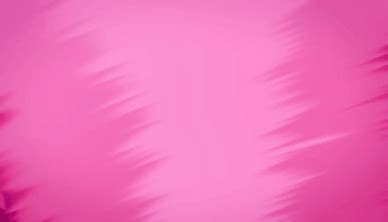 a pink background with blurry lines on it