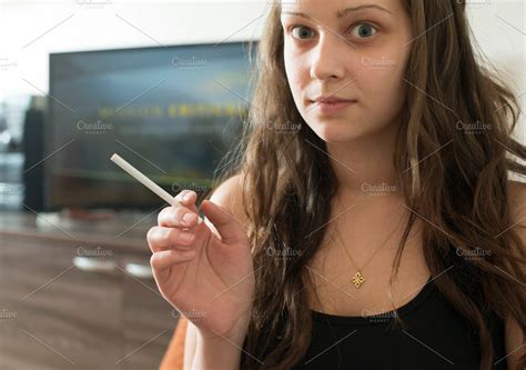 Girl smoke cigarette | High-Quality People Images ~ Creative Market