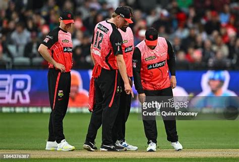 Renegades players look at the pitch during the BBL match between ...