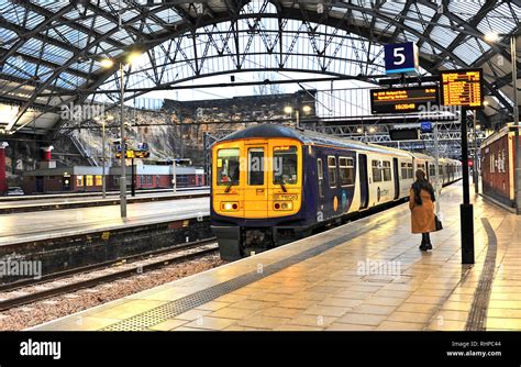 Train arriving at Liverpool Lime Street railway station at dusk in ...