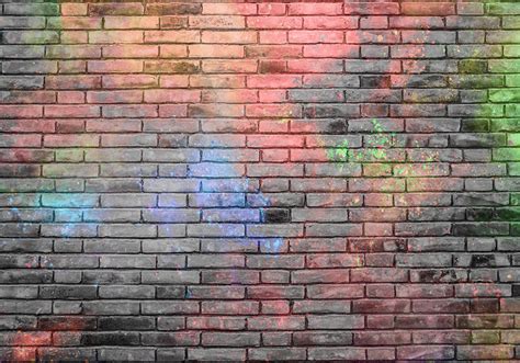 Colour splash on brick wall brick mural - TenStickers