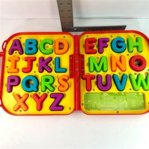 Elmo On The Go Sesame Street Alphabet Letters Red Carrying Case ...