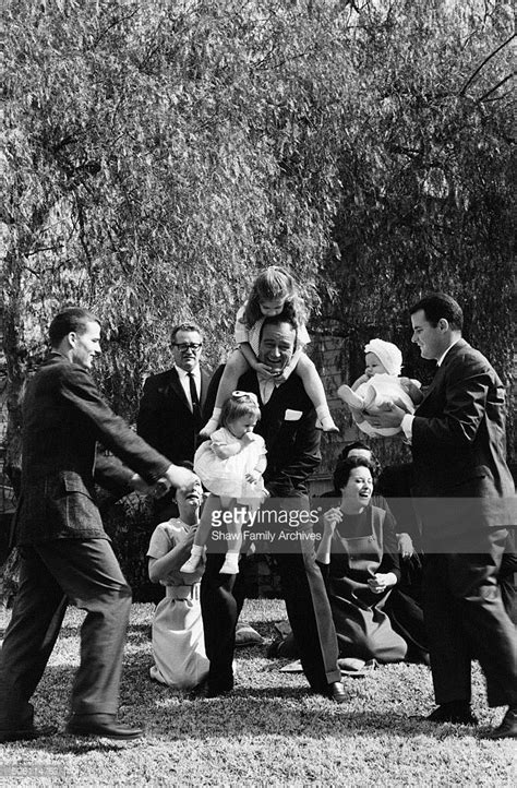 John Wayne at home with his children and grandchildren in 1960 in ...