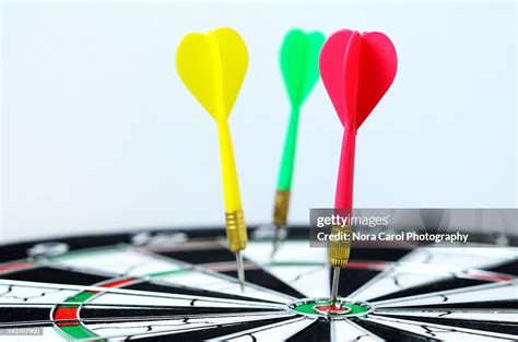 Darts On Bullseye High-Res Stock Photo - Getty Images