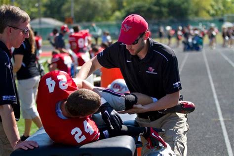 Sports Chiropractors as team physicians. Treating athletic injuries on the field | Sports ...