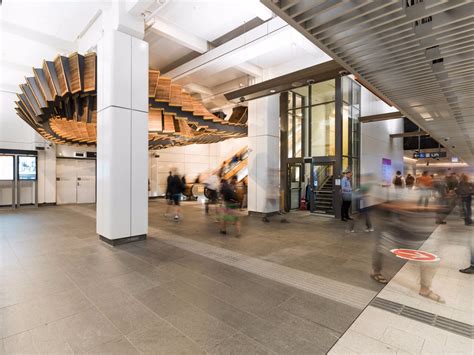 5 tons of vintage wooden escalator warped into spectacular subway sculpture