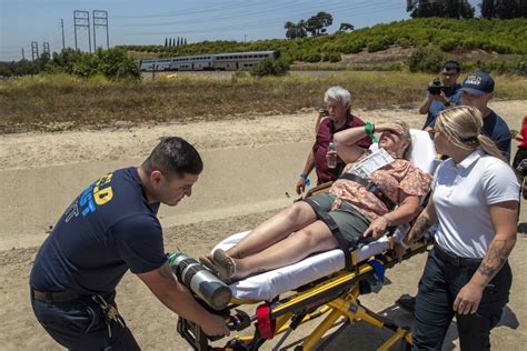 Amtrak train with almost 200 passengers derails after hitting water ...