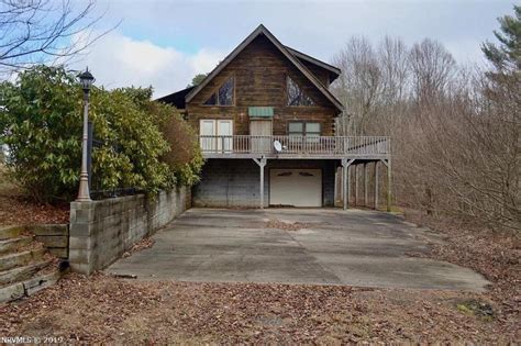 An Affordable Log Cabin For Sale in the Woods of Virginia