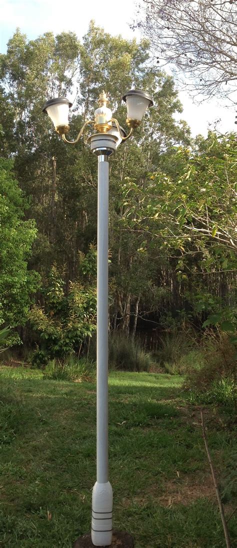 DIY solar street lights. Solar Street Light, Street Lights, Wood Circles, Diy Solar, Milk Bottle ...