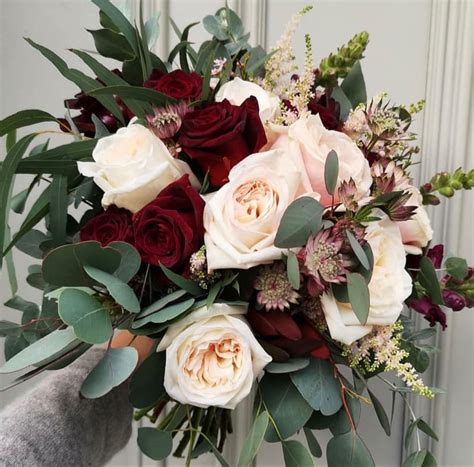 Burgundy Flowers | Flower centerpieces wedding, Red wedding flowers ...