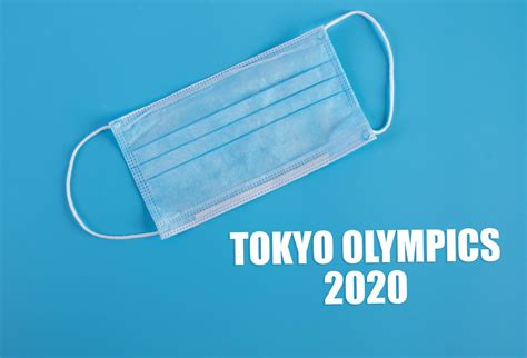 Medical face mask with Tokyo Olympics 2020 text on blue background - Creative Commons Bilder