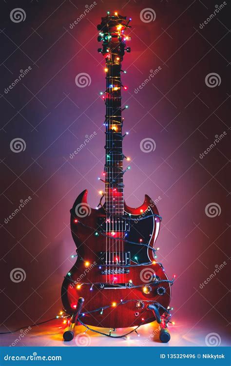 Electric Guitar with Christmas Garland Lights Stock Photo - Image of ...