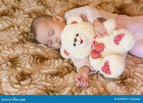 Baby Sleeping with Teddy Bear Stock Image - Image of background, childhood: 85609539