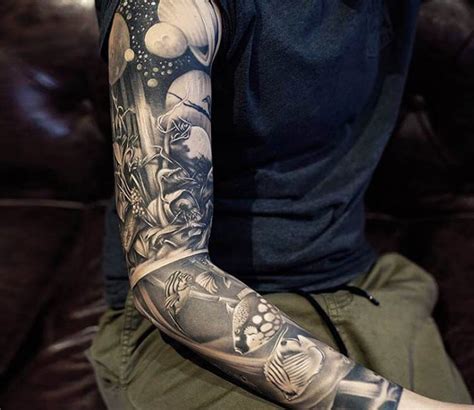 Black and grey sleeve tattoo by Khan Tattoo | Post 15311