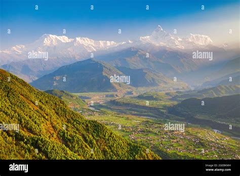 Annapurna massif aerial panoramic view from Sarangkot hill viewpoint in Himalayas mountain range ...