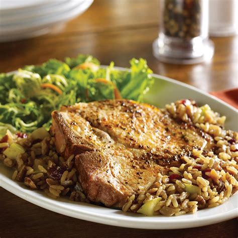 Pork Chops with Harvest Rice Pilaf | Zatarain's