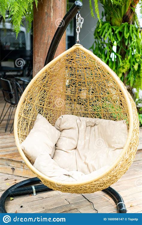 Outdoor Patio Wicker Swing Chair Stock Image - Image of rope, style ...