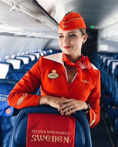 На изображении может находиться: 1 человек, сидит Aeroflot Airlines, Air Hostess Uniform, Flight ...