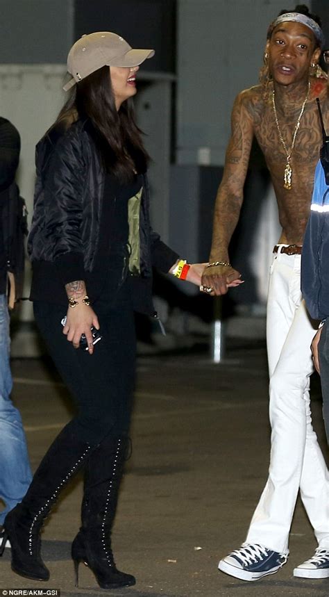 Wiz Khalifa holds hands with new girlfriend after concert (photos)