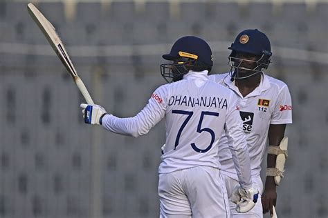 Dhananjaya de Silva celebrates a fifty | ESPNcricinfo.com