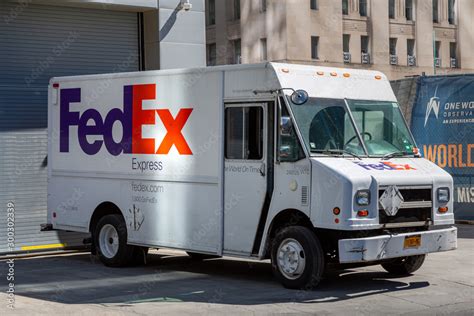 FedEx truck with a logo. FedEx is famous American multinational courier ...