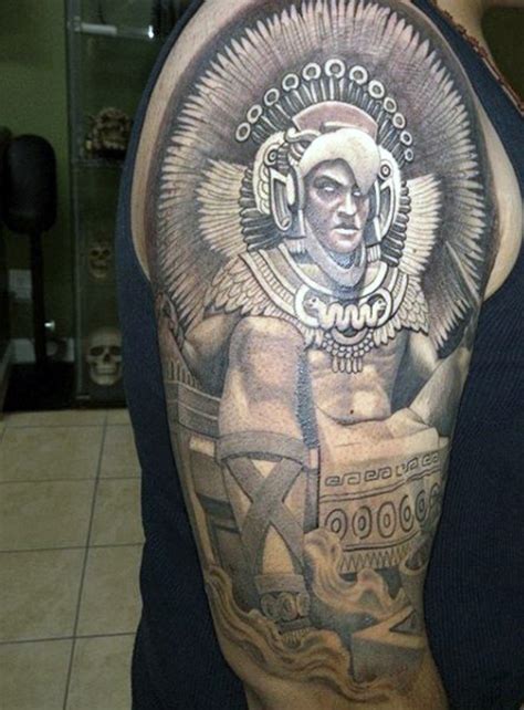 Marvelous looking colored shoulder tattoo of evil Mayan priest - Tattooimages.biz