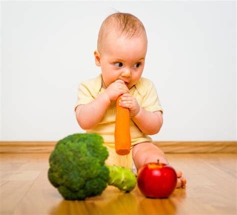 Baby Eating Fruits and Vegetables Stock Image - Image of person, brocoli: 65986503